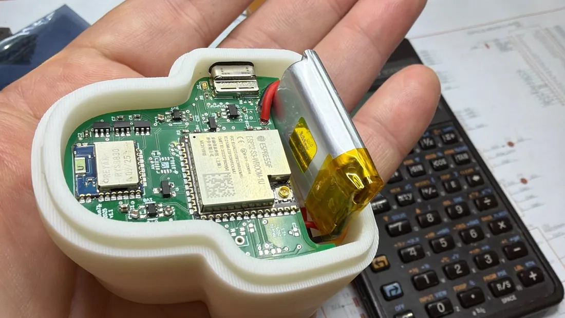 The PneumaSurface module in the palm of a hand, showing its processor, sensors and battery